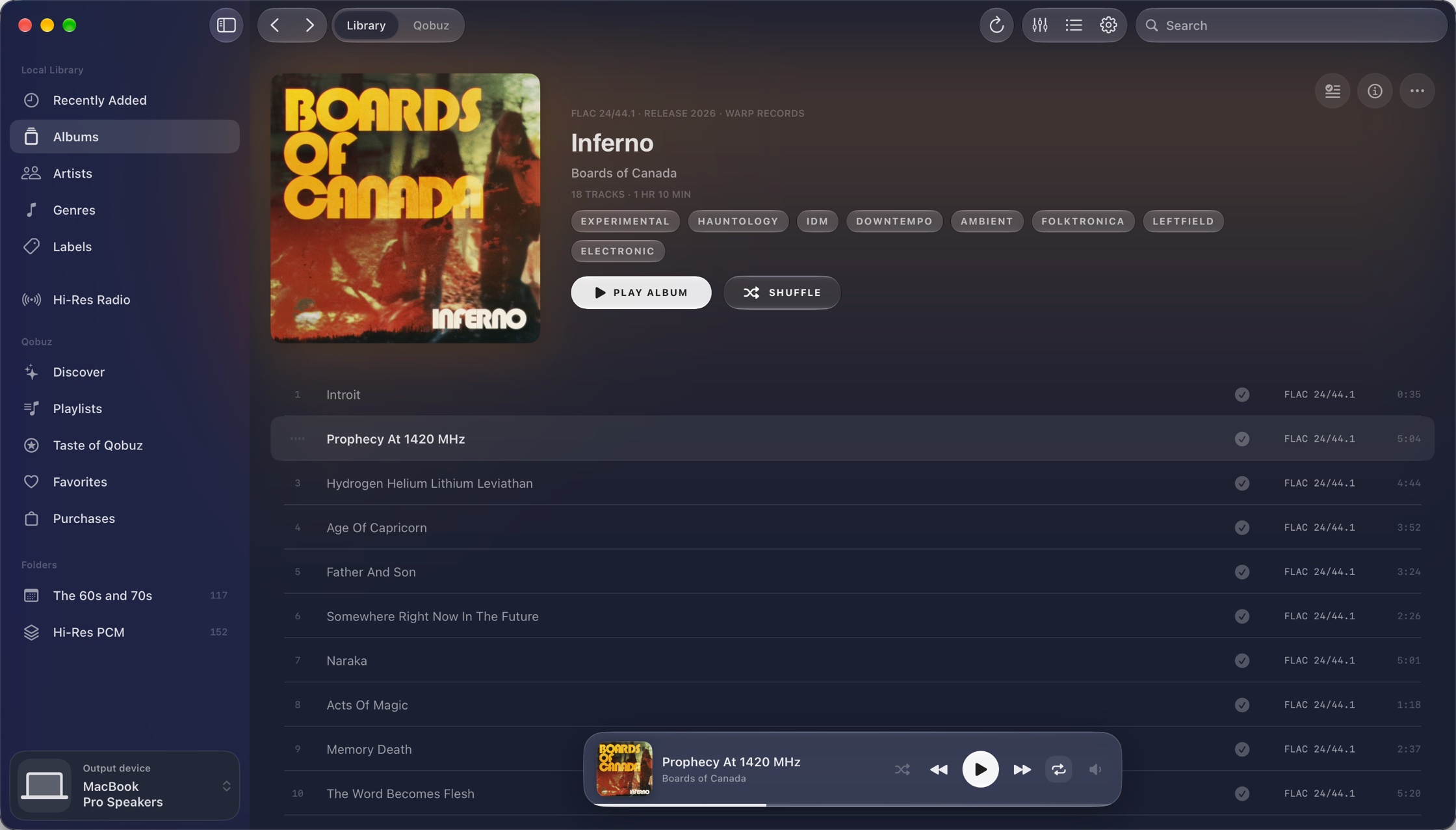 An album page in Loupe: cover, format and resolution, genres, and the track list