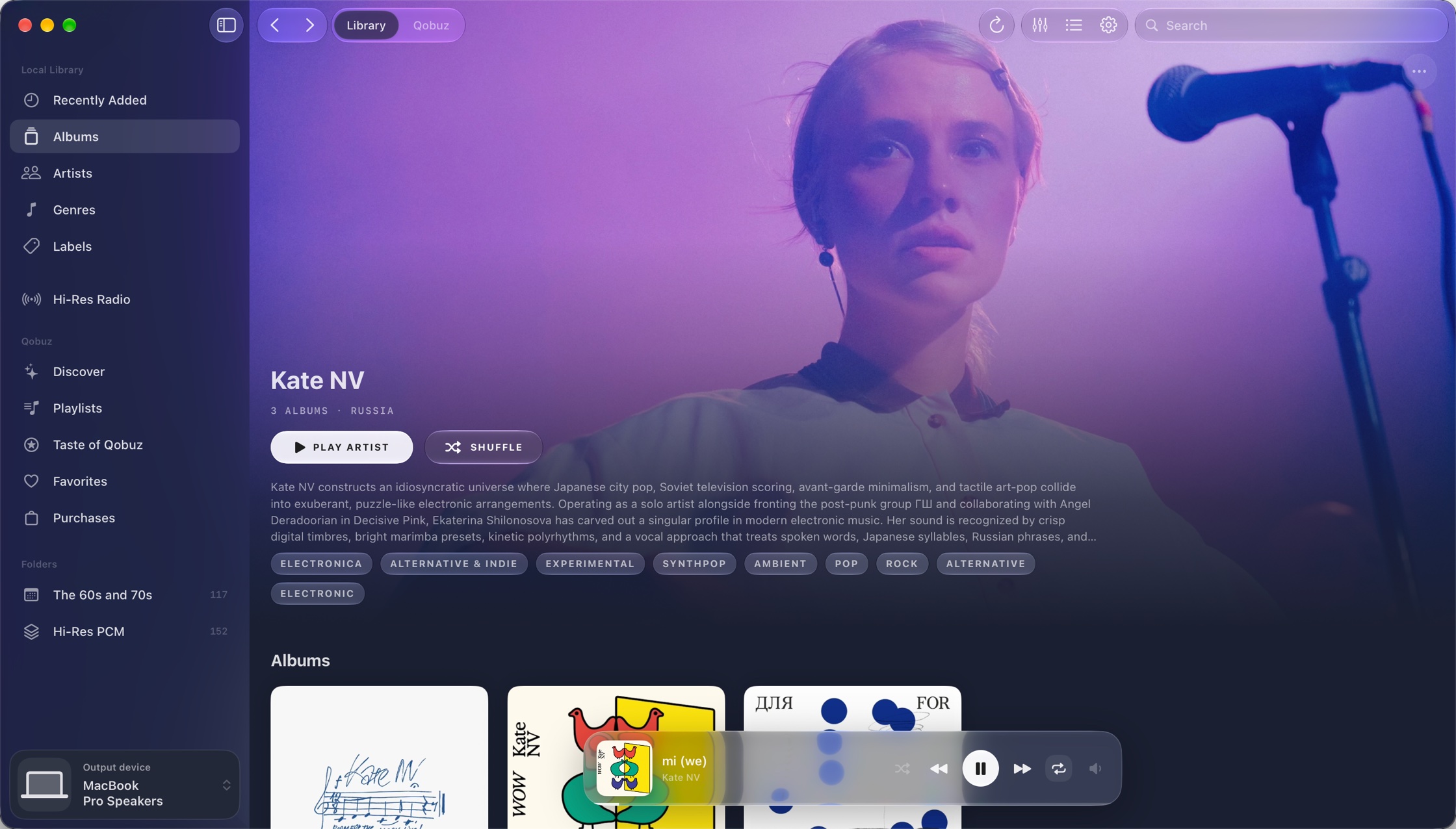 An artist page in Loupe: a full-width photo, biography, genres and albums